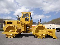 CATERPILLAR CAT WITH CAB 825B COMPACTOR WITH PUSH BLADE
