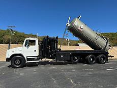 FREIGHTLINER FL112 KEITH HUBER KING VAC VACUUM TRUCK 3300 GALLON DUMPING TANK